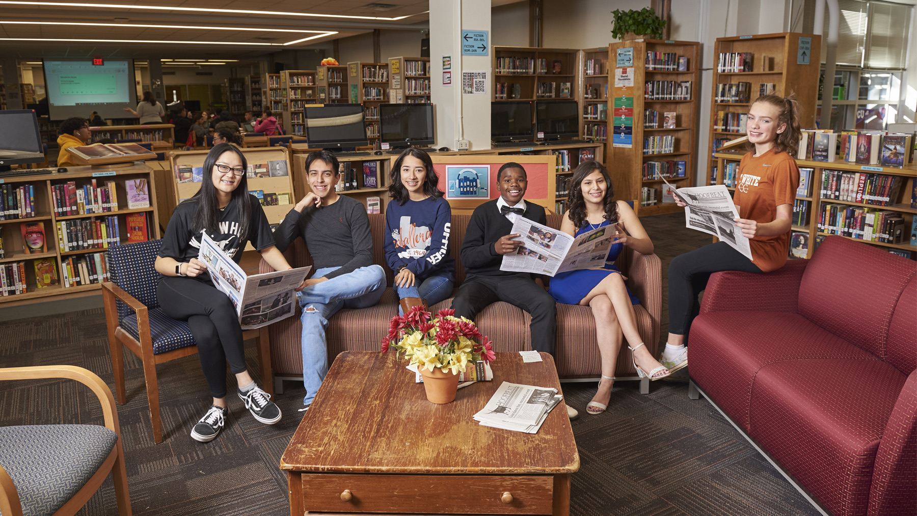 High school kids in a library