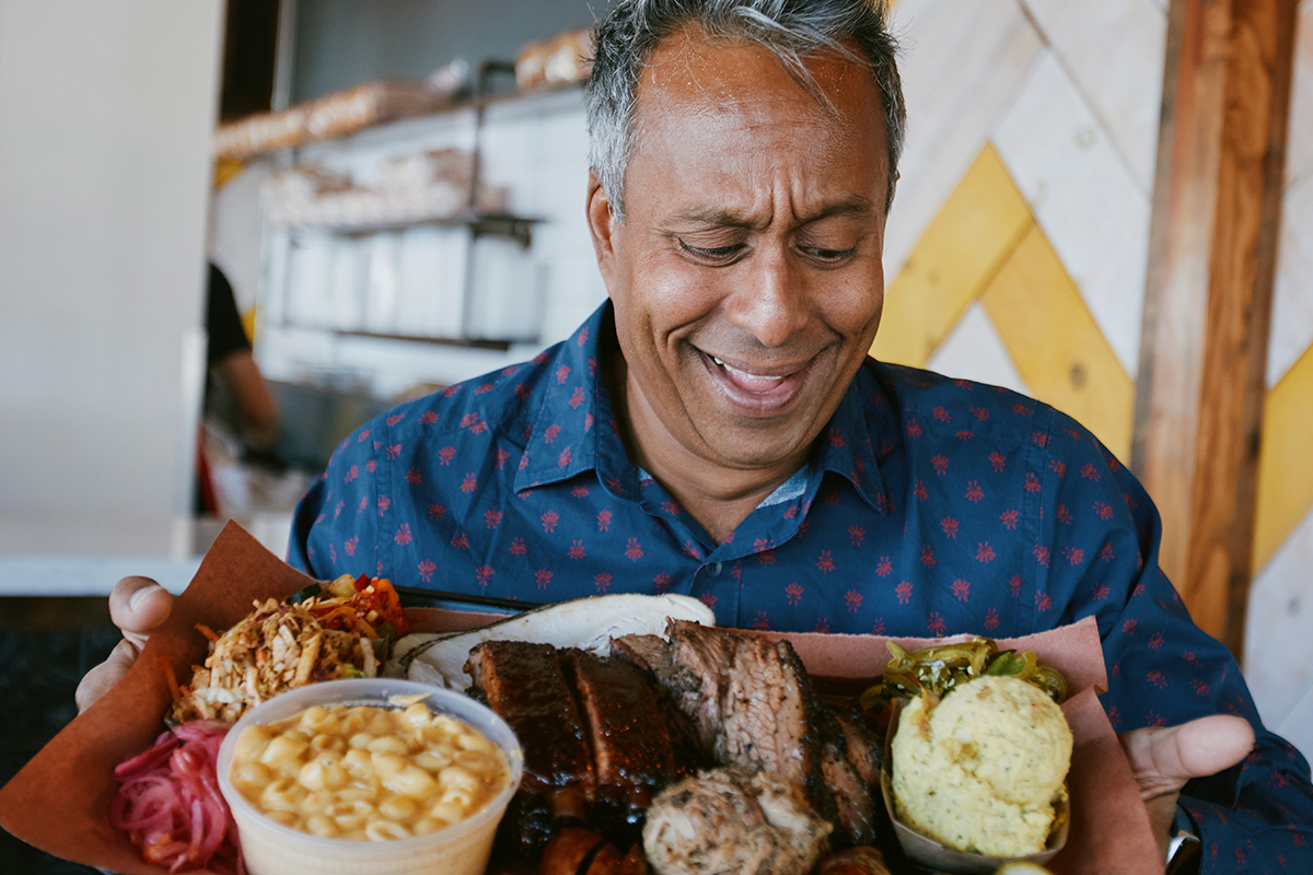 Ali Khan with a big platter of Texas barbecue